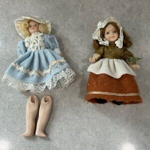 Porcelain Victorian Dolls(2) 4"has detached legs /blonde and 5"is intact/auburn
